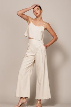 Flow-y wide legs punctuate these linen-blend pants designed with a pretty pearl trim at the ankles. • Pleated Detail• Side Zipper• Banded Waist• Pearl Trim• Pockets Linen Wide Leg Pants, Linen Crop Top, Fantasy Wardrobe, Linen Blend Pants, Wide Leg Linen Pants, Pants Design, The Pearl, Wide Legs, White Pants