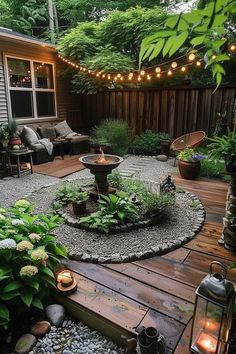 Cozy backyard garden with string lights, a fire pit, and outdoor seating. Surrounded by lush greenery and potted plants, creating a relaxing atmosphere. Outdoor Napping Area, Multipurpose Outdoor Space, Small Backyard Sitting Area Ideas, Cozy Yard Ideas, Green Backyard Ideas, Mobile Home Backyard Ideas, Small Cozy Garden, Flat Backyard Landscaping Ideas, Rental Friendly Backyard Ideas