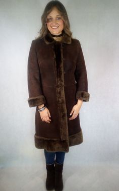 Vintage_ Lambskin Shearling Coat Hippe Boho Coat Winter Coat. The coat is very nicely sewn, fitted at the waist. The skin is soft and fits well on figure. Tag Say Excentric Club. Made in Germany. Dimensions: from arm to arm: 45 cm sleeve from the collar: 70 cm sleeve from armpit: 38 cm chest: 86 cm waist: 86 cm hips: 102 cm total length: 115 cm Our model is 173 tall and wear L size. Lambskin Coat, Boho Coat, Penny Lane Coat, Coat Winter, Penny Lane, Shearling Coat, Boho Bohemian, Winter Coat, Fur Coat