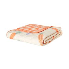 an orange and white checkered blanket is folded on top of each other, with the bottom