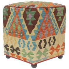 a multicolored ottoman with wheels is shown