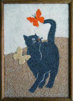 a painting of a black cat with two orange butterflies on it's back paws