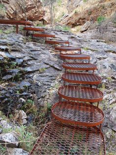 there are many metal steps going up the hill