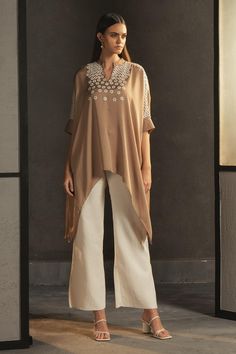 Buy Beige Satin Embroidery Band Collar Asymmetric Kaftan Tunic For Women by Namrata Joshipura Online at Aza Fashions. Indo Western Outfits For Women, Tunic Designs, Dress Design Patterns, New Address, Designer Party Wear Dresses