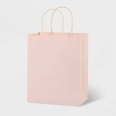 a pink shopping bag on a white background