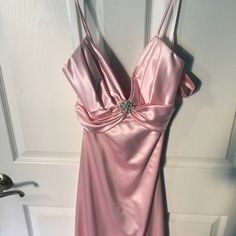 Light Pink Satin Material Prom Dress. The Back Is Very Strappy And Open. Never Worn Out, Just Been Sitting In My Closet For A Couple Years. No Tailoring Done. Comes With A Matching Sash Of The Same Material. Could Fit 0-2 Mauve Homecoming Dress, 2000 Hoco Dress, Mermaid Hoco Dresses, 80s Pink Prom Dress, Aqua Homecoming Dresses, Pink 90s Prom Dress, Hoco Ideas Dresses, Pink Silk Dress Outfit, Hoco Dresses Satin