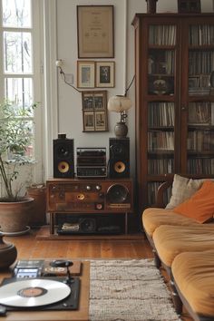 a living room filled with furniture and lots of books