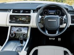 the interior of a modern car with dashboard and steering wheel