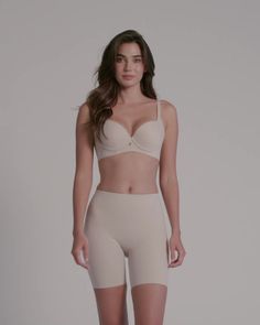 This innovative short is made of our signature DuraFit® moderate compression fabric to shape the tummy and upper thighs. The waistband is double-layered for extra shaping power in the tummy and waist. In addition to shaping, it also prevents chafing. It's soft on skin and hides cellulite for a smoothed-out look. It doesn't have any leg bands for total comfort. The back is specially designed for a natural butt-lifting effect. This shaper short has a seamless design to go undetectable under clothe Sculpting Shapewear With Built-in Bra In Short Length, Sculpting Shapewear With Built-in Bra, Mid-thigh Length, Sculpting Shapewear With Built-in Bra, Short Length, Elegant Compression Shapewear With Built-in Bra, Fitted Shapewear With Built-in Bra Short Length, Compression Beige Shapewear With Built-in Bra, Beige Compression Shapewear With Built-in Bra, Fitted Shorts With Built-in Bra, Mid-thigh Length, Compression Shapewear With Built-in Bra In Elastane