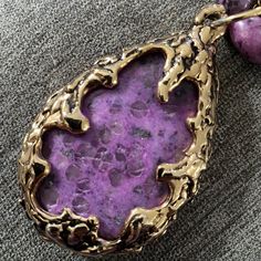 The Love Witch Pendant Necklace Purple Vintage Costume Pendant And Necklace. Vintage Ornate Flame. This Pendant Is Gold Toned Costume Jewelry. See Photos For Size Of Pendant. Some I Have Sold Are Larger This One Is A Little Smaller. This Is Not A Clear Plastic, Seems To Be Purple Lace Agate And The Necklace Is Heavier But Stone Is Smaller Than The Plastic Ones. Thanks For Looking! Witch Pendant, Purple Lace, Gem Necklace, Lace Agate, Purple Gold, Vintage Costumes, Costume Jewelry, Womens Jewelry Necklace, Witch