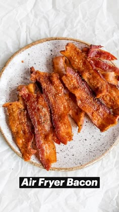 bacon strips on a white plate