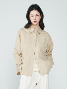 Composition : COTTON 100%Country of Origin : Republic of Korea Classic Cotton Blouse In Neutral Color, Classic Neutral Cotton Blouse, Beige Cotton Blouse For Work, Beige Blouse For Business Casual In Fall, Fall Business Casual Beige Blouse, Beige Relaxed Fit Button-up Top, Classic Khaki Tops For Everyday, Classic Everyday Khaki Tops, Oversized Neutral Top For Workwear