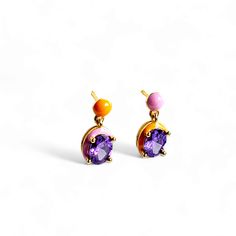 Introducing our Dazzle Drop stud Earrings - where urban edge meets timeless elegance. The Amethyst drop gold hoops bring that city sparkle, while the premium finish cloisonné enamel work in pink and orange add a touch of mystique. The irregular mismatch colour gives it a fresh look. Elevate your everyday with these effortlessly chic earrings - a dance of sophistication and a dash of downtown cool. Because your style deserves that perfect blend of urban and elegant. Material: 16K Gold plated on 9 Teardrop Enamel Earrings For Gifts, Single Enamel Drop Earring, Chic Earrings, Cloisonne Enamel, Gold Hoops, Gold Studs, Gold Earrings Studs, Jewelry Earrings Hoops, Earring Gifts