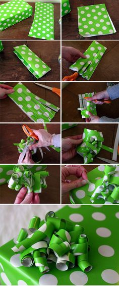 green and white polka dot wrapping paper on top of a wooden table with scissors in it