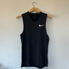 Tags Removed But Never Worn! Perfect Condition. Nike Sporty Sleeveless Vest, Nike Functional Sleeveless Top, Nike Sleeveless Sports Vest, Nike Casual Sleeveless Vest, Casual Nike Sleeveless Vest, Functional Black Sleeveless Tops, Nike Black Sleeveless Top, Nike Functional Sleeveless Tank Top, Nike Sporty Sleeveless Tops