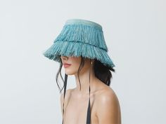 Frayed Lampshade Hat With Narrow Ribbon Extravaganza in a single piece. We wanted to get the sensation of a palm tree accompanying you but we didn‘t knew it would turn out this chic. The Panama Hat, also known as Montecristi Hat is a traditional Ecuadorian model made with 100% Toquilla Straw, a natural fiber known for its quality and beauty. The perfect beach-to-city accessory, elegant, yet fresh and versatile for original matches with different kinds of fashion. - We ship with DHL Express. Ship Lamp Shade Hat, Festival Hat With Woven Detail And Short Brim, Artistic Beach Hat, Woven Festival Hat One Size, Summer Hats With Ribbon, Adjustable, Recycled Hats, Multicolor Woven Festival Hat, Lampshade Hat, Fringe Hat