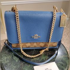 Nwot Shoulder Or Cross Body Formal Blue Bag With Chain Strap, Formal Blue Shoulder Bag With Chain Strap, Luxury Blue Bag With Chain Detail, Luxury Blue Bags With Chain Detail, Luxury Blue Bags With Chain, Elegant Blue Bag With Chain Detail, Luxury Blue Chain Bags, Formal Blue Bag With Chain, Blue Coach Shoulder Bag With Gold-tone Hardware