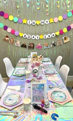 a table set up for a birthday party