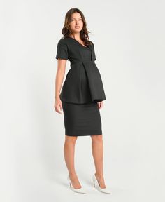 Can you think of any garment that makes a woman look more effortlessly polished than a gorgeous, well-made maternity pencil skirt? The tailored, over-belly Elizabeth Maternity Pencil Skirt will keep you looking boardroom ready through all stages of maternity. Its elevated, Italian designed stretch material combines the power of a suit with the comfort of your favorite leggings. Its soft and strong over-belly stretch material will cradle your bump and support your back through any meeting - no ma Chic Office Dress With Relaxed Skirt, Fitted Workwear Dress With Lined Skirt, Chic Fitted Short Sleeve Maternity Dress, Chic Fitted Maternity Dress With Short Sleeves, Black Lined Skirt Dress For Work, Chic Fitted Maternity Dress, Chic Fitted Knee-length Maternity Dress, Modern Knee-length Pencil Skirt For Formal Occasions, Maternity Office Wear