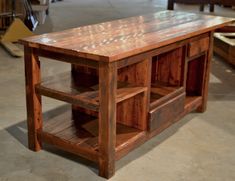 a table made out of wooden pallets in a warehouse