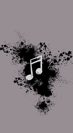 a black and white music note with grungy paint splatters