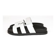 This pair of Chypre sandals are in white and feature the iconic H and a velcro crossover strap. Origin: ItalyCondition: New and never wornAccompanied by: Hermes box, dustbags, ribbonSize: 35.5 EU Spring Leather Sandals With Logo Strap, Leather Sandals With Logo Strap For Spring, Modern White Open Toe Sport Sandals, Modern White Sport Sandals With Round Toe, Modern White Sandals With Rubber Sole, Modern White Sport Sandals, Designer White Sandals With Leather Sole, White Slides With Leather Sole For Spring, White Leather Sole Slides For Spring