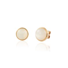 These statement earrings are set in 14K yellow gold, with beautiful Moonstone. A perfect gift for your loved ones. -Material - 14K Solid Gold -Gemstone - Moonstone -Gemstone Weight - 9.660 ct -Gross weight - 4.4 grams Moonstone enhances intuition, promotes inspiration, success and good fortune in love and business matters. Moonstone aids the digestive system, assimilates nutrients, eliminates toxins and fluid retention, and alleviates degenerative conditions of skin, hair, eyes, and fleshy organ White Cabochon Earrings For Anniversary, Elegant Moonstone Earrings For Formal Occasions, Modern Moonstone Earrings As Gift, Elegant Moonstone Earrings As Gift, Elegant Moonstone Earrings For Gift, Modern Yellow Gold Birthstone Earrings, Formal Round Moonstone Earrings, Elegant Yellow Gold Moonstone Earrings, Moonstone Round Yellow Gold Earrings