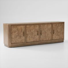 the sideboard is made out of wood and has an intricate design on it's sides