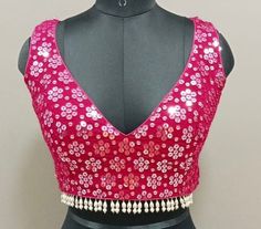 This Made to Order/Made to Measurement/Custom Made Indian Ethnic Blouse. - Fabric - Mirror Work Georgette - Color - Hot Pink  - Princess Cut - Rich Lined - Sleeveless - Extra margin and extra stitches included in the blouse - It can be customize in any color, design or size  MEAUREMENTS & CUSTOMIZATIONS This blouse can be purchased in your standard sizing and pattern. Please choose your Chest Size (measured in inches) from the drop-down box.. For custom sizing please include the below measuremen Sleeveless Sequined Blouse Piece For Diwali, Bohemian Sleeveless Blouse With Zari Work, Sleeveless Blouse Piece With Mirror Work For Festivals, Sleeveless Bohemian Blouse Piece With Zari Work, Designer Sleeveless Bohemian Choli, Sleeveless Motif Choli For Parties, Sleeveless Mirror Work Choli For Festival, Sleeveless Unstitched Blouse For Festival, Bohemian Sleeveless Choli With Mirror Work