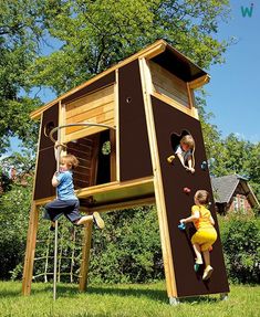 two children playing on a wooden climbing tower