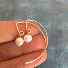 Modern pearl threader earrings pearl drop earrings pearl | Etsy Hammered Pearl Jewelry Gift, Handmade Minimalist Pearl White Pearl Earrings, Hammered Pearl Jewelry For Wedding, Elegant Adjustable White Wrap Earrings, Elegant White Adjustable Wrap Earrings, White Pearl Threader Earrings With Charm, Hammered Drop Pearl Earrings As Gift, White Hammered Dangle Jewelry, White Threader Earrings With Pearl Charm As Gift