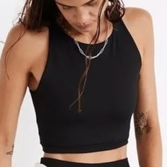 Madewell Mwl Form Racerback Crop Tank Top Black Na554 The Fabric: Supersoft With Zero See-Through, Mwl Form Has Four-Way Stretch For Holds-You-Up Compression, Bounce-Back Recovery And Maximum Flexibility. The Fit: This Fully Lined Crop Has A High '90s Neckline And A Cutaway Racer Back (Wear It For Low-Impact Yoga Flows Or As A Top With High-Rise Jeans Or Leggings). Made For: Yoga Flows Or Tiktok Scrolls. Compressive. Moisture Wicking. Made Of 82% Recycled Nylon/18% Spandex. Do Well: Nylon Is Rec Black Athleisure Sports Bra For Everyday, Everyday Athleisure Black Sports Bra, Everyday Black Athleisure Sports Bra, Black Tank Crop Top With Medium Support, Black Scoop Neck Crop Top For Gym, Black Tank Crop Top For Yoga, Casual Black Sports Bra For Everyday, Black Racerback Top With Medium Support, Black Cropped Tank Top For Gym