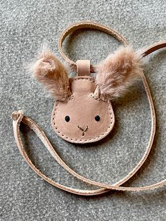 We're suckers for cute. And for serious craftsmanship. So we were truly delighted to discover the Dutch makers Donsje. Sustainably sourced, fair trade, made by hand and made to last. Darling leather accessories that make everyone smile. "Winter Bunny" necklace is 2" long on a 21" leather cord. Cute Handmade Everyday Jewelry, Cute Handmade Jewelry For Daily Wear, Handmade Brown Necklace For Everyday, Handmade Brown Necklaces For Everyday Use, Cute Handmade Brown Jewelry, Bee Backpack, How To Upcycle Clothes, Winter Bunny, Bunny Necklace