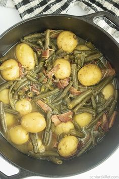 some potatoes and green beans in a pot