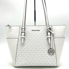 Brand New With Tag Michael Kors Charlotte Large Top Zip Tote Color: Optic White Silver Toned Hardware 2 Slip-In Back Pocket On Side Pvc Leather With Pebbled Leather Trim 1 Mk Circle Charm Zip Top Closure Custom Fabric Lining Interiors: 2 Slip-In Pockets And 1 Zipped Pocket 15"(Top) 11"(Bottom) X 10"(H) X 4.5"(D) Straps: 9.5" Modern White Shoulder Bag With Branded Hardware, White Shoulder Bag With Silver-tone Hardware And Double Handle, White Bags With Silver-tone Hardware And Double Handle, White Tote Shoulder Bag With Silver-tone Hardware, White Bags With Silver-tone Hardware For Everyday Use, White Bags With Silver-tone Hardware For Errands, White Shoulder Bag With Branded Hardware For Travel, Michael Kors White Double Handle Bag, Michael Kors White Bag With Handles