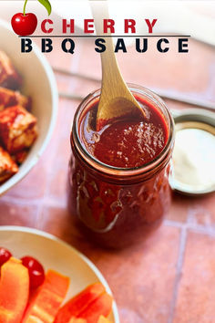 Top angled view of a clear mason jar with cherry bbq sauce. A wooden spoon is scooping some up. On the table around the jar are some marinated items and fresh veggies. Cottage Core Recipes, Cottage Core Food, Spices Recipes, Vegan Summer Recipes, Vegetable Platter