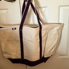 a large white bag hanging on the door