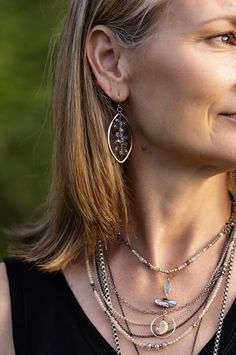 A fun pair of statement earrings, this artisan design rests at approximately 1.75" from sterling silver ear wires. Antique Silver Plated Brass (Lead & Nickel Free) Crystal 2.25" with sterling silver ear wires We hand select our natural materials, thus there may be slight variations in color and/or size that will not detract from the overall aesthetic. Our unique handcrafted designer jewelry for women is made in America, each design created individually in our personal design studio in Floyd, VA Floyd Va, Designer Handmade Jewellery, Artisan Design, Designer Jewelry, Ear Wires, Windsor, Natural Materials, Statement Earrings, Antique Silver