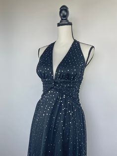 Jump Apparel black halter neck dress with ruching under the bust and silver reflective painted sequins. Measurements Size 5/6 (Fits like a small/medium 6/8) Materials 100% polyester Please message me regarding any sizing questions or concerns. ☻ Follow along for previews on new styles coming in and styling tips on Instagram @maryiaandco✨ Black Fitted Halter Dress For Party, Fitted Black Halter Dress For Party, Fitted Ruched Halter Dress For Evening, Black Fitted Halter Dress For Evening, Fitted Sequin Halter Dress For Date Night, Ruched Fitted Halter Dress For Evening, Black Halter Neck Dress For Gala, Glamorous Black Halter Dress For Evening, Black Ruched Halter Neck Dress