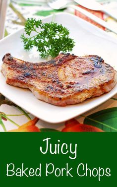 juicy baked pork chops on a white plate