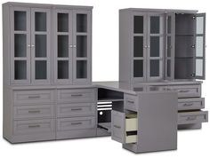 two gray cabinets with drawers and glass doors