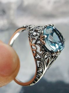 sky blue aquamarine ring with swirl antique floral sterling silver filigree Sky Blue Topaz Ring, Aquamarine Ring, Sky Blue Topaz, Aquamarine Stone, Sterling Silver Filigree, Blue Gems, Aquamarine Rings, Topaz Stone, Filigree Ring