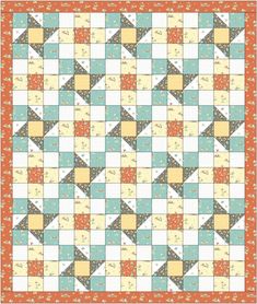 an orange, yellow and blue quilt pattern