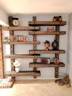 a living room with bookshelves made out of wooden planks