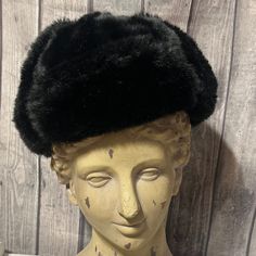 Beautiful black faux fur trapper hat. Has lined inside, has snap enclosure that can be snapped on top of the hat or under the chin. Measures 22 inches around. Black Faux Fur Hat For Fall, Black Hat With Faux Fur Lining And Ear Flaps, Black Hats With Faux Fur Lining For Cold Weather, Black Wool Cap For Winter, Black Cloche Hat For Winter, Black Faux Fur Hat With Faux Fur Trim, Black Winter Beret, Faux Fur Trimmed Hat With Short Brim, Faux Fur Trim Hat With Short Brim