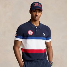 Part of the Polo Ralph Lauren Team USA Collection this knit Polo shirt is proudly made for Team USA’s flagbearer to wear during the Closing Ceremony of the Olympic and Paralympic Games Paris 2024. Made in America with US-grown cotton it is crafted with innovative flat-knit technology that aims to minimize waste from excess fabric and features the official logo patch of the U.S. Olympic Team as well as our signature embroidered Big Pony. Navy Cotton Tops With Three Stripes Branding, Navy Cotton Striped Tops, Navy Ralph Lauren Cotton Tops, Sporty Cotton Tops For 4th Of July, Cotton Sports Tops With Three Stripes, Navy Cotton Tops With Three Stripes, Navy Cotton Top With Three Stripes, Team Spirit Cotton Polo Shirt For Sports Events, Collegiate Cotton Short Sleeve Polo Shirt