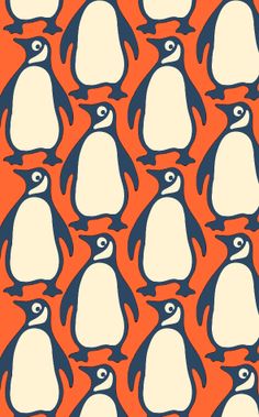 an orange and blue penguin pattern with black penguins on it's sides, all facing different directions