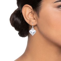 Add to your bold style with these sterling silver puff heart drop earrings. Add to your bold style with these sterling silver puff heart drop earrings. Nickel free Metal: sterling silver Backings: Frenchwire Packaging: boxed Plating: rhodium Finish: polished Diameter: 27.9 mm x 12.8 mm Size: One Size. Color: White. Gender: female. Age Group: adult. Polished Finish Heart Earrings For Gift, Valentine's Day Polished Finish Earrings, Sterling Silver Heart Earrings With Polished Finish, Valentine's Day Teardrop Sterling Silver Heart Earrings, Teardrop Heart Earrings In Sterling Silver, Puffed Heart, Heart Drop Earrings, Bold Style, Bold Fashion