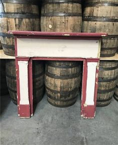 an old fireplace made out of wine barrels