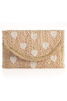 Add some sweetness to your summer accessories with Shiraleah's Hearts Clutch. Made from natural woven jute in a sleek clutch silhouette, it is a classic neutral bag to go with any outfit or occasion. Its elegant beaded heart design will never go out of style. Pair with other Shiraleah items to complete your look! Features an elegant beaded heart design, magnetic snap closure, and 1 inner slip pocket Shiraleah is a trend-driven lifestyle brand focused on the little gifts that make life special! M Heart-shaped Summer Bag For Everyday Use, Heart-shaped Summer Bags For Everyday Use, Heart-shaped Summer Bags For Gifts, Heart-shaped Summer Bag For Gifts, Heart-shaped Summer Gift Bags, Heart Clutch, Neutral Bag, Beaded Heart, Wedges Style